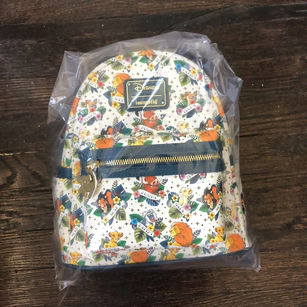 Loungefly x Disney lion king  tattoo mini back pack white multi NWT